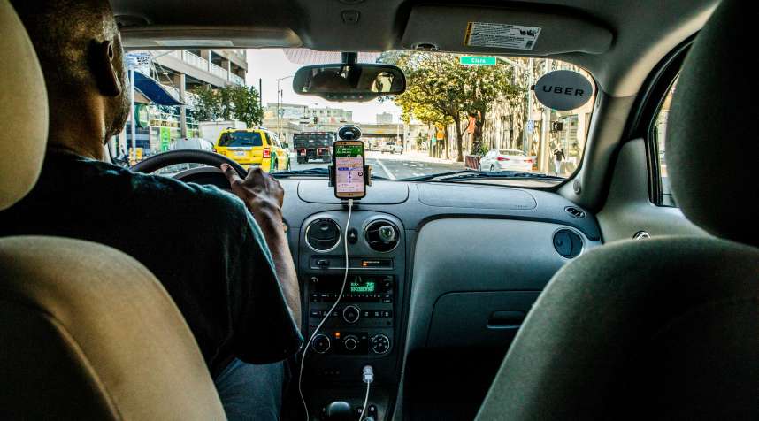 An Uber driver in San Francisco, May 14, 2017. Uber drivers on July 12 won a tentative victory in their long-running legal battle to be classified as employees rather than independent contractors after a federal court gave conditional certification to a class-action lawsuit by several Uber drivers that was brought under the Fair Labor Standards Act.