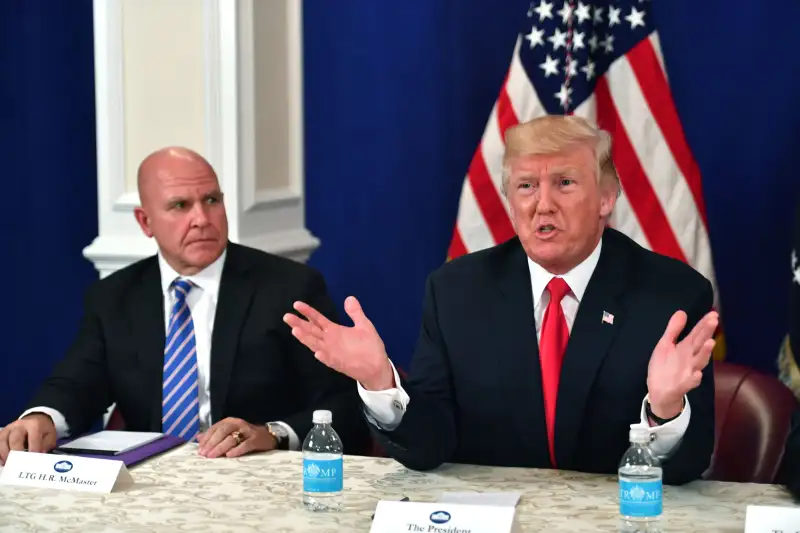 US President Donald Trump, with National Security Advisor H. R. McMaster, speaks during a security briefing on August 10, 2017, at his Bedminster National Golf Club in New Jersey.