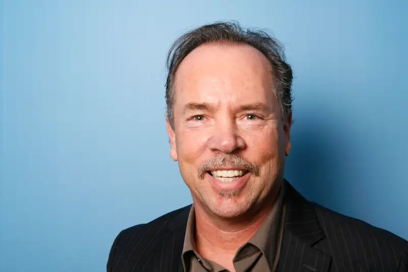 Mitch Lowe, President of Redbox Automated Retail LLC, poses for a portrait before speaking at the Reuters Global Media Summit in New York December 2, 2009.