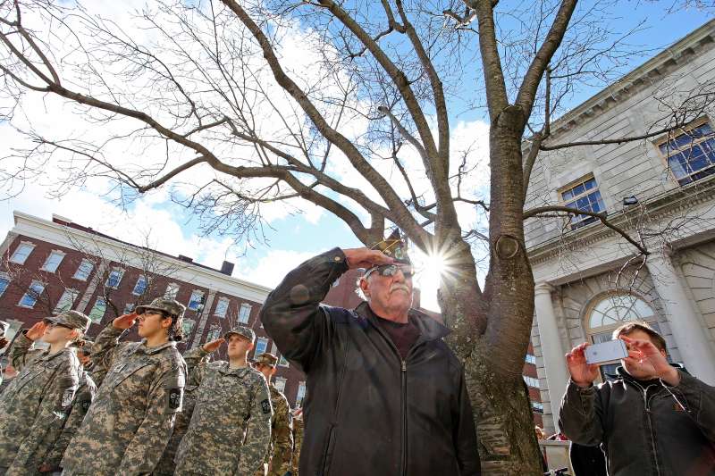 Paul Avery, commander of Harold T. Andrews American Legion Post 17, salutes during Veteran's Day ceremonies in Portland, Maine.