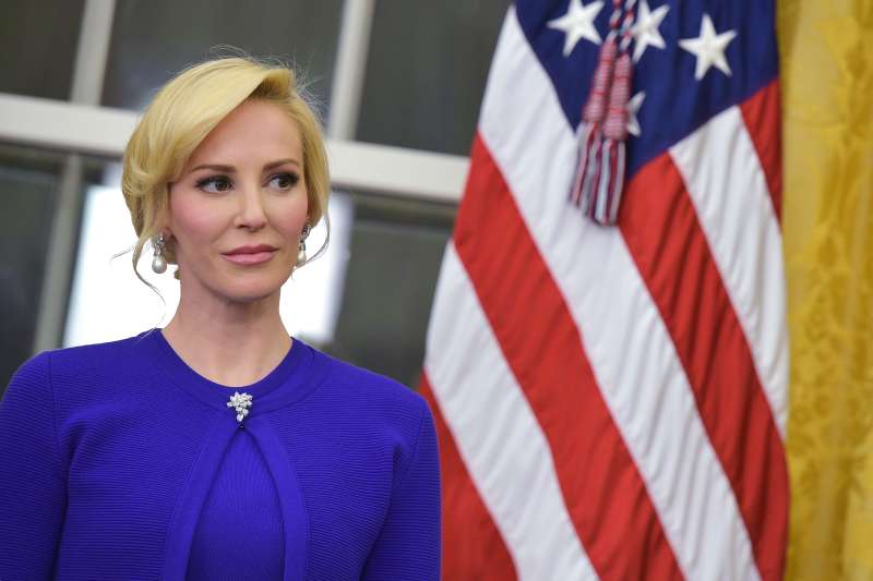 Louise Linton, the wife of Treasury Secretary Steven Mnuchin, watches as speaks after taking the oath of office in the Oval Office of the White House on February 13, 2017 in Washington, DC.