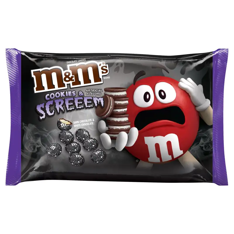 A small pack, Halloween version of M&M chocolate candy Stock Photo