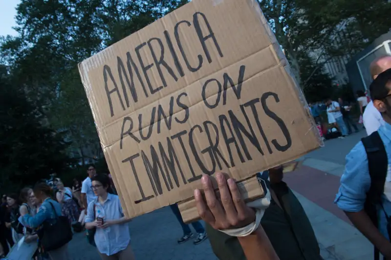 Protesters hold signs at a rally to defend DACA on September 5, 2017 in New York. US President Donald Trump ended an amnesty protecting 800,000 people brought to the US illegally as minors from deportation. I am here today to announce that the program known as DACA that was effectuated under the Obama Administration is being rescinded, US Attorney General Jeff Sessions announced.