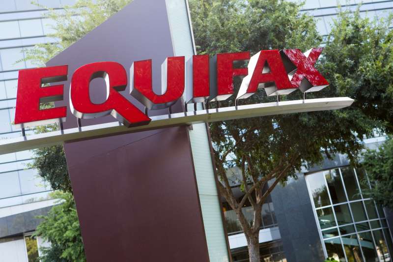 A logo sign outside of the headquarters of the consumer credit rating firm Equifax in Atlanta, Georgia on September 1, 2012. The company recently revealed a data breach that could have comprised the personal information of up to 143 million people.