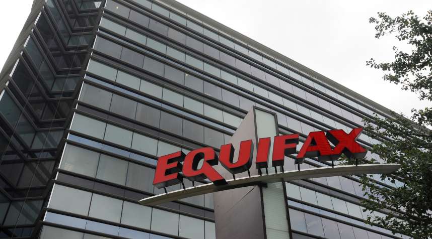 This July 21, 2012, photo shows Equifax Inc., offices in Atlanta. Credit monitoring company Equifax says a breach exposed social security numbers and other data from about 143 million Americans. The Atlanta-based company said Thursday, Sept. 7, 2017, that  criminals  exploited a U.S. website application to access files between mid-May and July of this year.