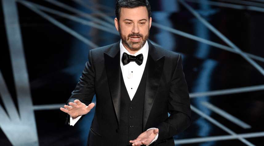 In this Sunday, Feb. 26, 2017, file photo, host Jimmy Kimmel speaks at the Oscars at the Dolby Theatre in Los Angeles. Kimmel says his newborn son is home and doing great after open-heart surgery. A tearful Kimmel turned his show's monologue Monday, May 1, into an emotional recounting of the crisis with what Kimmel called a  happy ending.