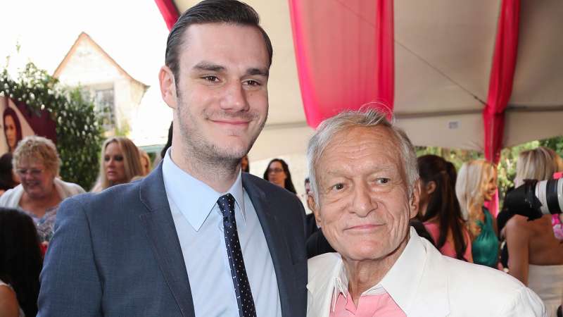 Playboy Founder Hugh Hefner and and his son Cooper Hefner attend Playmate of the Year at the Mansion