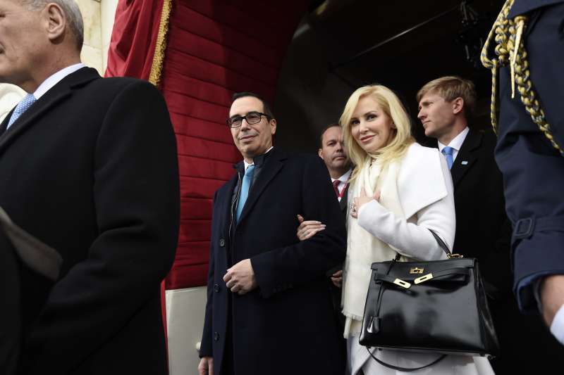 U.S. Treasury Secretary nominee Stephen Mnuchin and fiancee Louise Linton arrive for the Presidential Inauguration of Donald Trump at the U.S. Capitol on January 20, 2017 in Washington, DC.