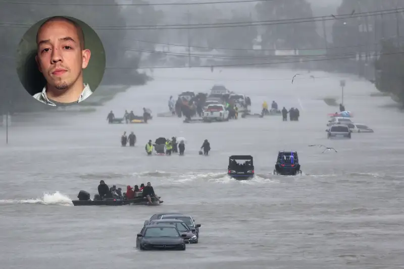 Residents wait to be rescued from the flood waters of Tropical Storm Harvey in Beaumont Place, Houston