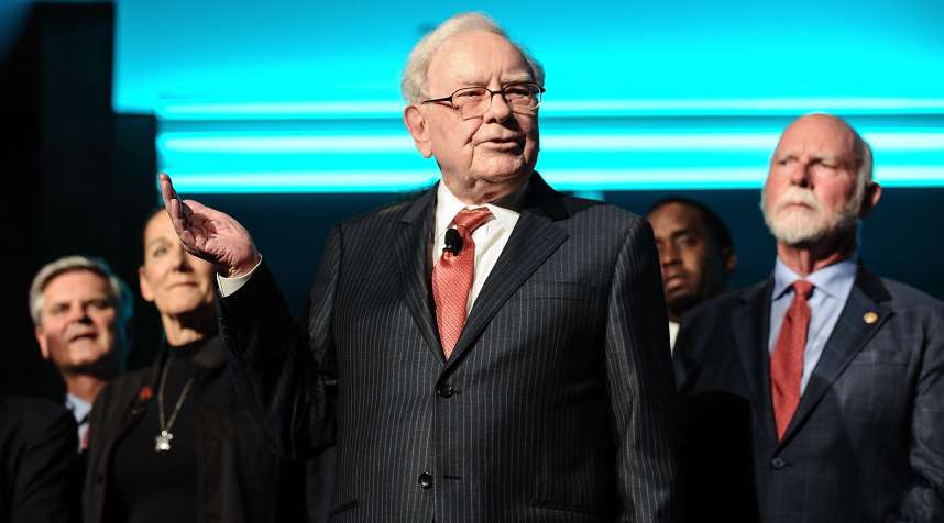 Warren Buffett (C) is joined onstage by 24 other honorees at a celebration of the Forbes list of 100 Greatest Business Minds.