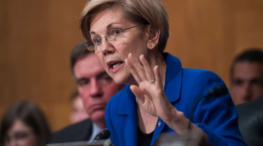 Sen. Elizabeth Warren, D-Mass., questions Richard Smith, CEO of Equifax, during a Senate Banking, Housing and Urban Affairs Committee hearing in Dirksen on the company's security breach on October 4, 2017.