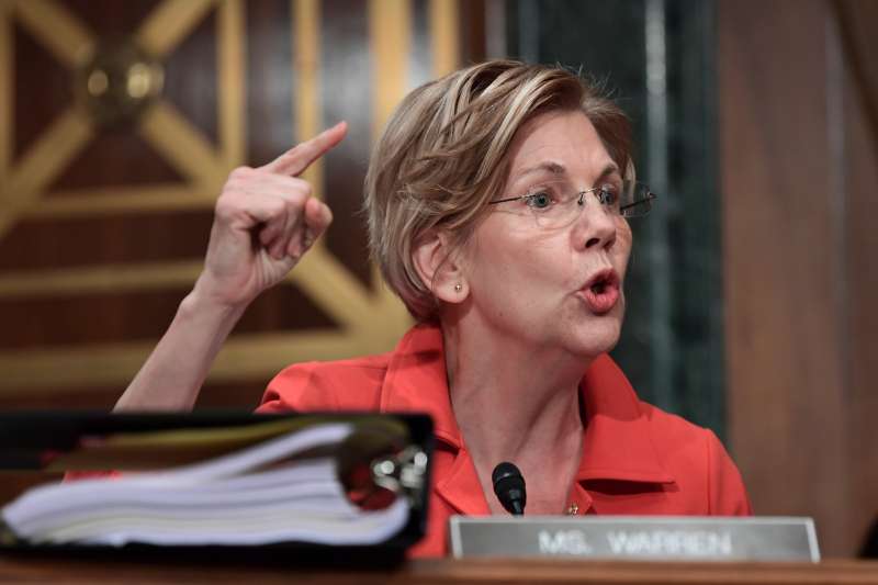Sen. Elizabeth Warren, D-Mass., questions Wells Fargo Chief Executive Officer and President Timothy Sloan as he testifies before the Senate Committee on Banking, Housing and Urban Affairs on Capitol Hill in Washington, Tuesday, Oct. 3, 2017.