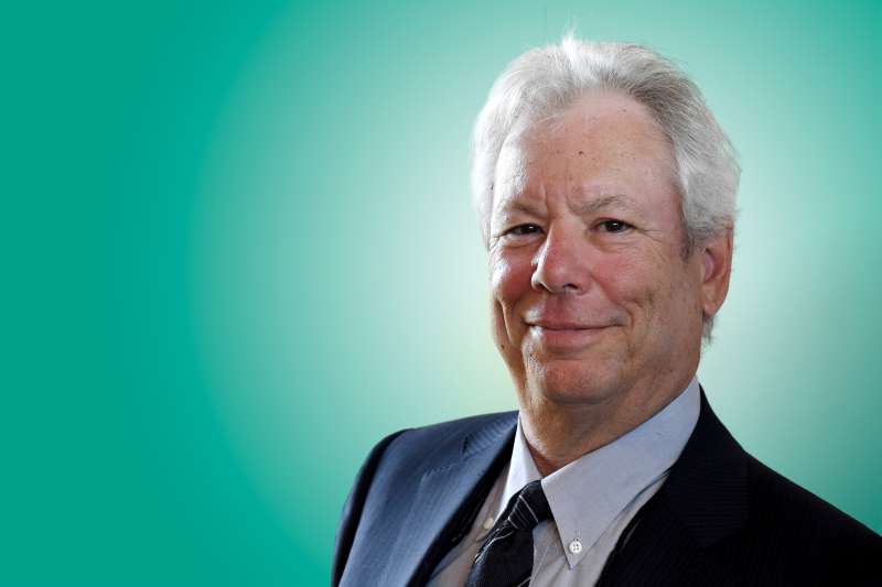 In this June 22, 2014 file photo, US economist Richard Thaler poses for a photo during the award ceremony for the world economy prize in Kiel, Germany. The Nobel economics prize has been awarded to Thaler of the University of Chicago for his contributions to behavioral economics.