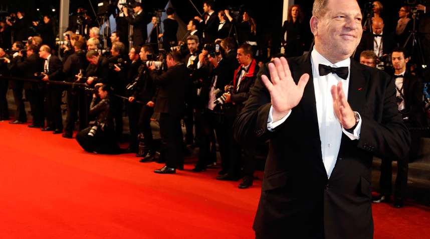 Producer Harvey Weinstein poses on the red carpet as he arrives for the screening of the film  Only God Forgives  in competition during the 66th Cannes Film Festival in Cannes May 22, 2013.