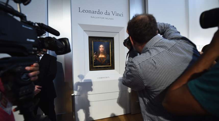 Christie's unveils Leonardo da Vinci's 'Salvator Mundi' (pictured) with Andy Warhol's 'Sixty Last Suppers' at Christie's New York on October 10, 2017 in New York City.
