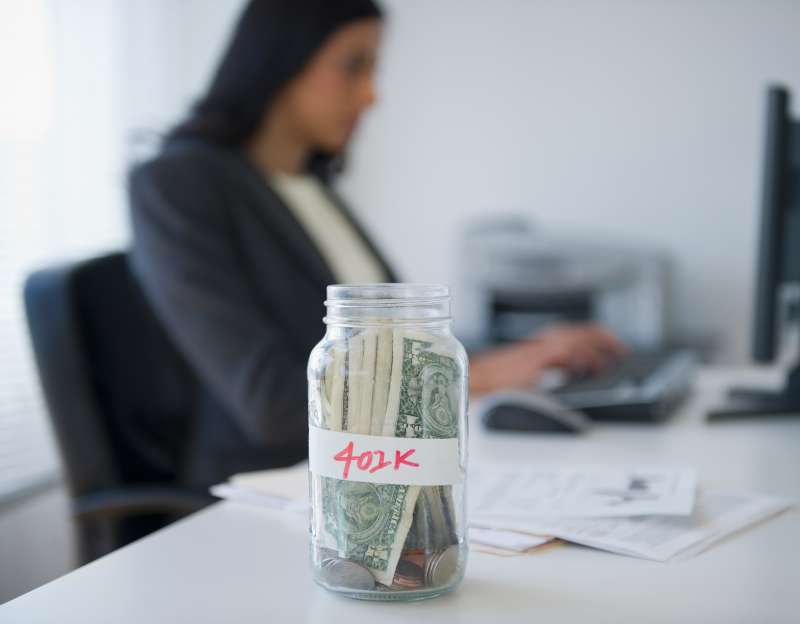 Cash in a jar marked 401k