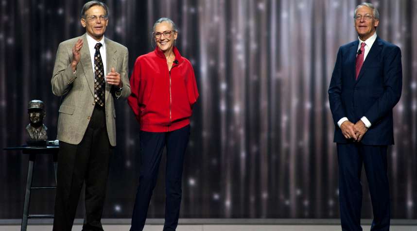 Jim Walton, chairman and chief executive officer of Arvest Bank Group Inc., from left, Alice Walton, and Rob Walton, chairman of Wal-Mart Stores Inc.
