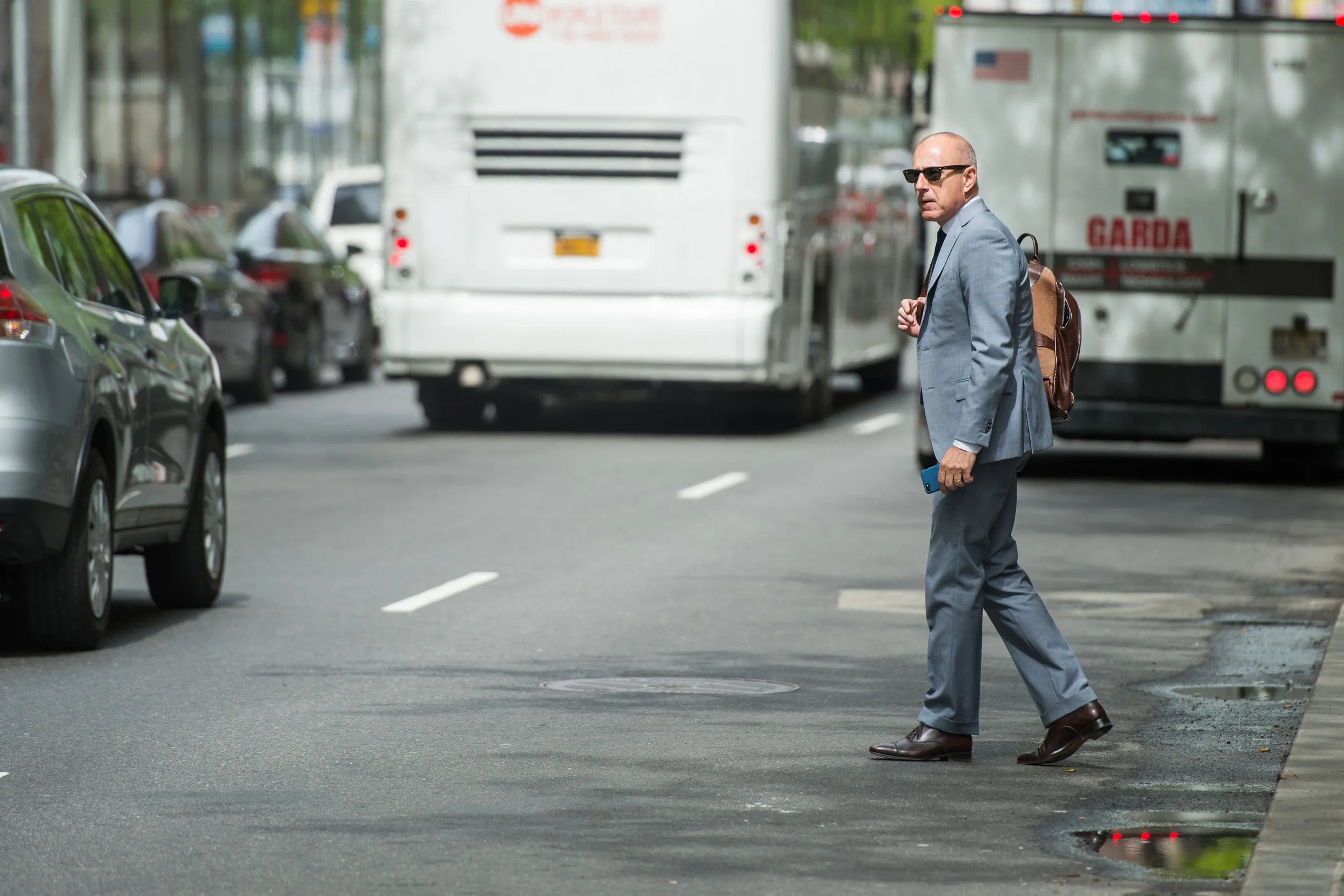 Matt Lauer and Charlie Rose spotted at the same Hamptons party