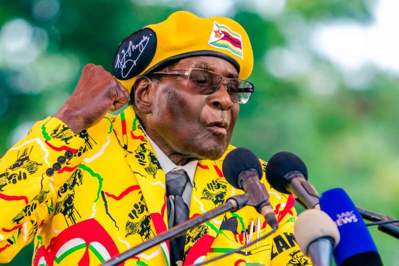 Zimbabwe's President Robert Mugabe addresses party members and supporters gathered at his party headquarters