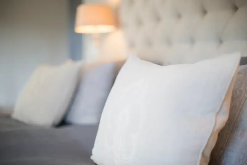 Pillows on bed in luxury bedroom