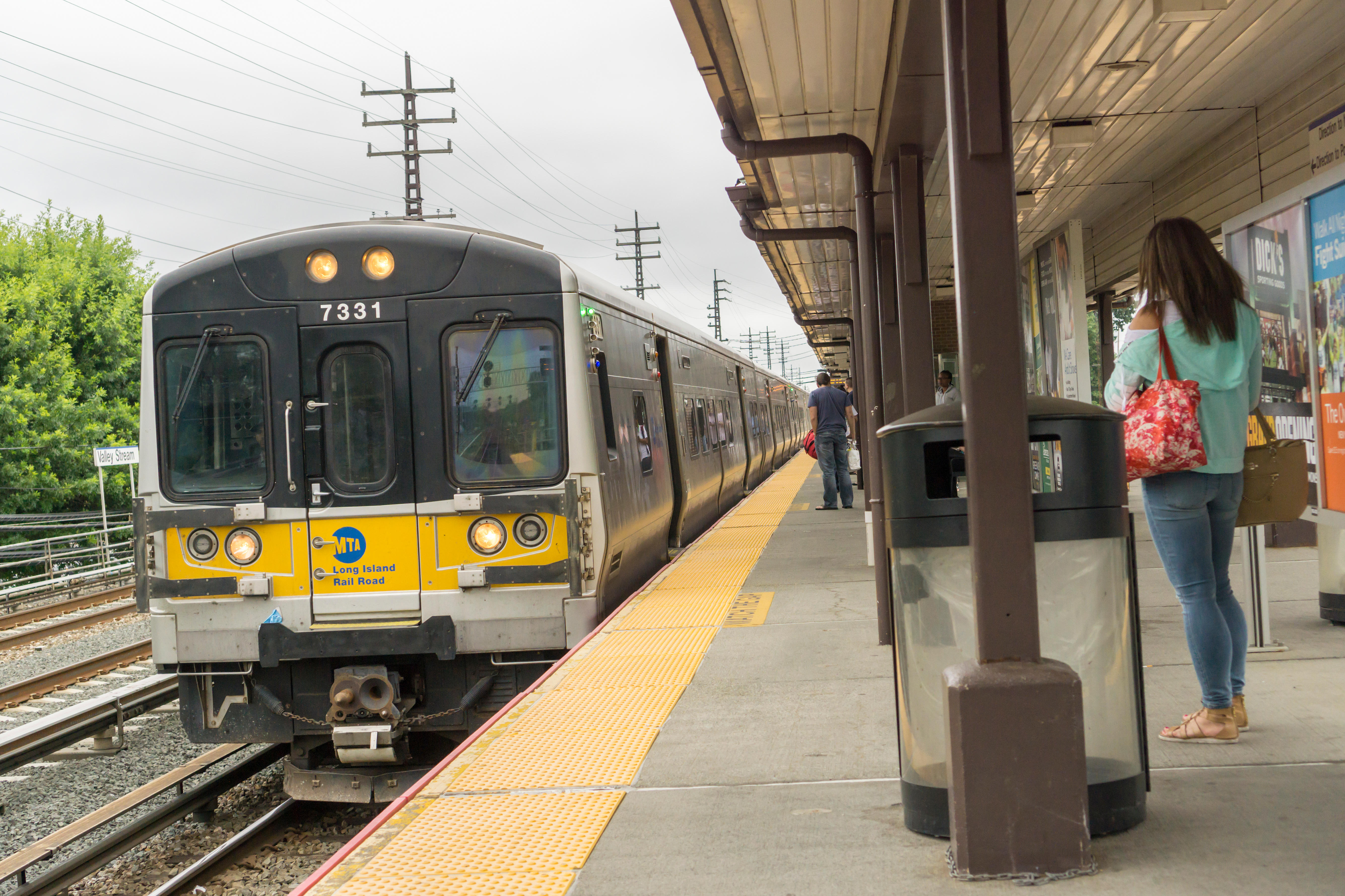 A Long Island Railroad (LIRR) commuter train arrives at the Valley Stream, Long Island station on Saturday, July 9, 2016. (Â© Richard B. Levine)
