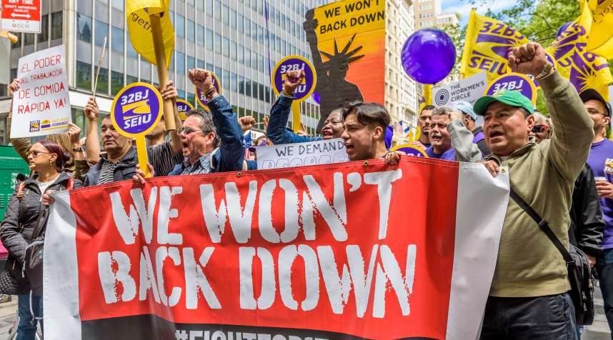 Ahead of an expected City Council vote, fast-food workers and their supporters held a rally outside New York City Hall in May 2017.