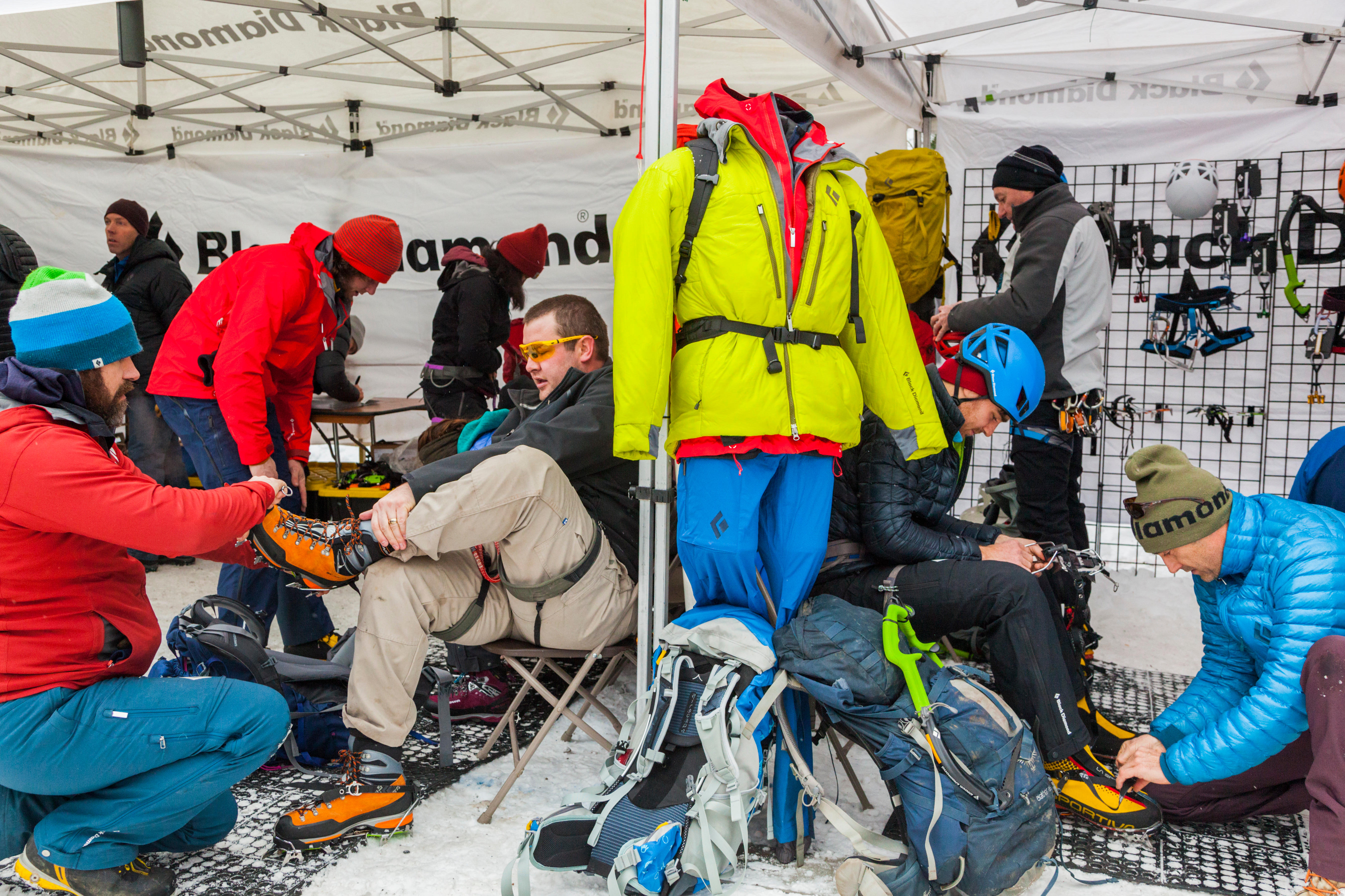 Attendees are equipped with demo climbing gear at the Black Diamond booth during the Ouray Ice Festival, Ouray Ice Park, Ouray, Colorado.