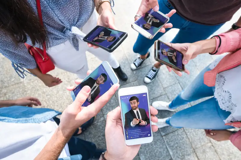 A group of friends playing HQ Trivia