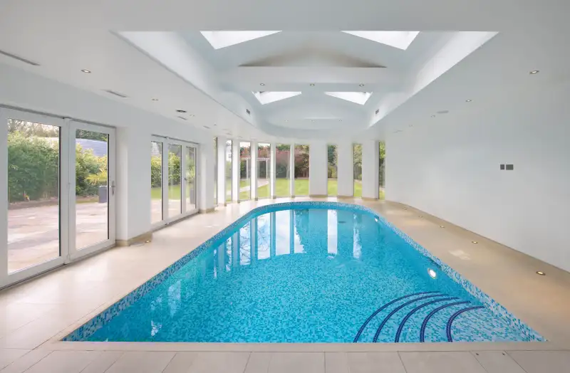 Indoor swimming pool in patio setting