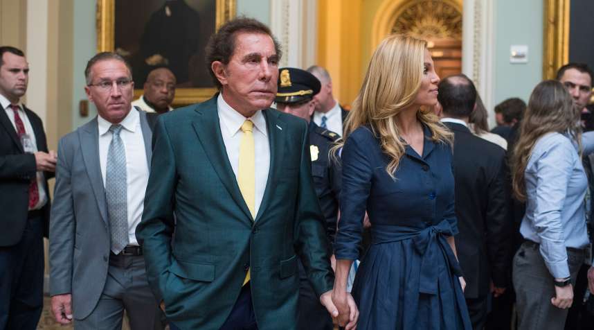 Casino developer Steve Wynn and his current wife Andrea Hissom make their way to the Senate Policy luncheon in the Capitol on June 27, 2017.