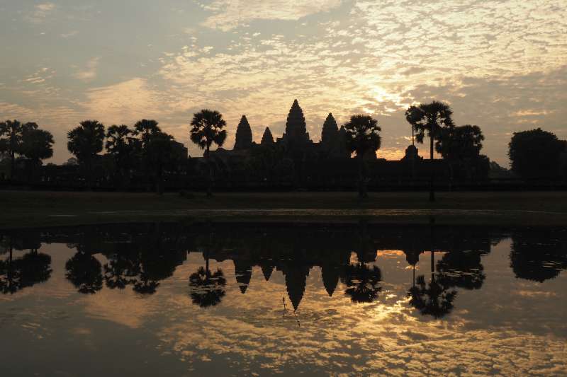 Angkor Wat at sunrise. The temple was built by the King Suryavarman II in the early 12th century in the capital of the Khmer Empire.