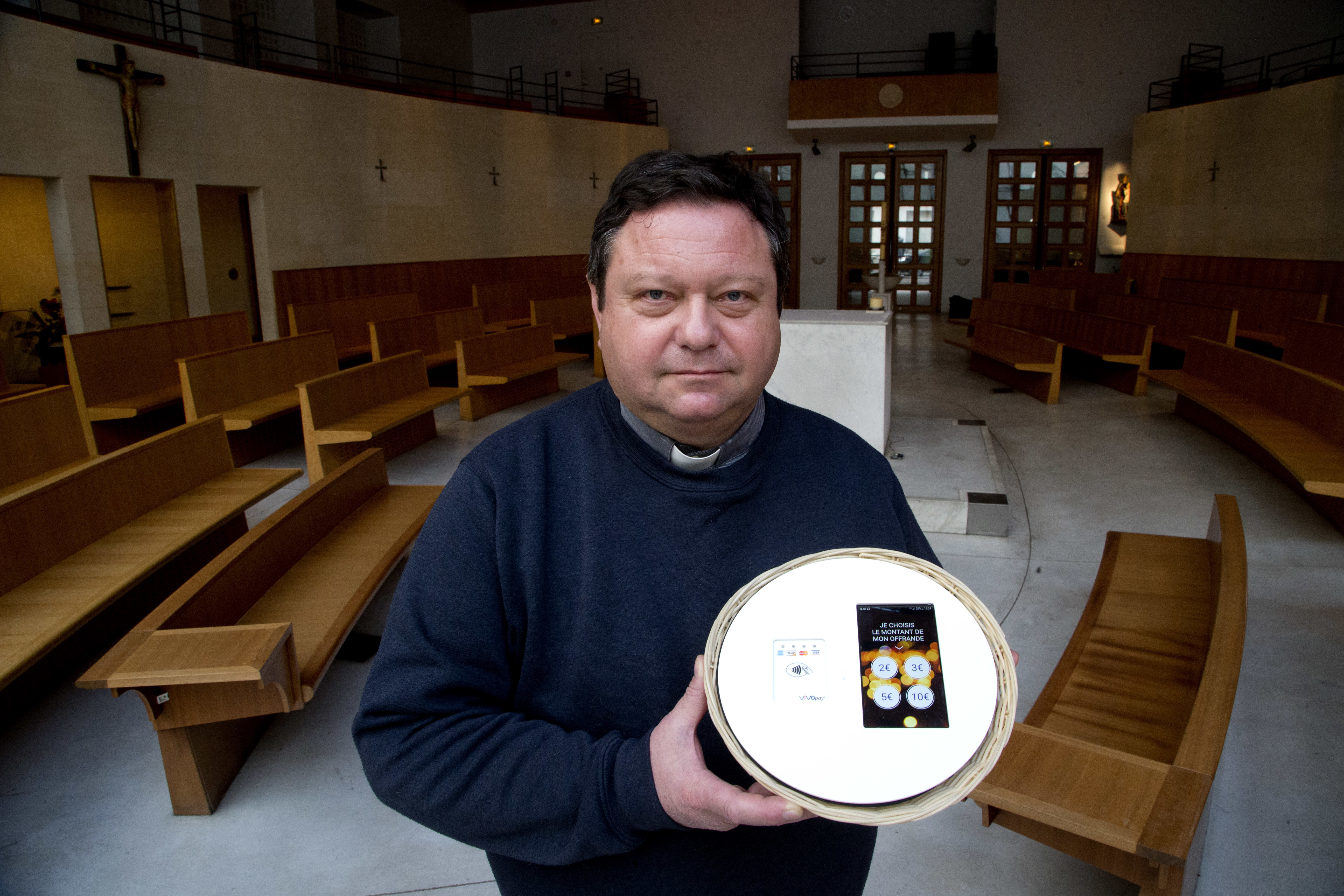 These Churches Are Using Digital Baskets to Collect Donations During Mass