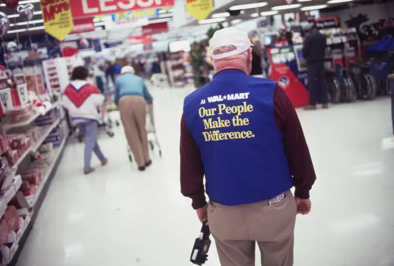 Wal Mart Employee Wearing Inspirational Slogan