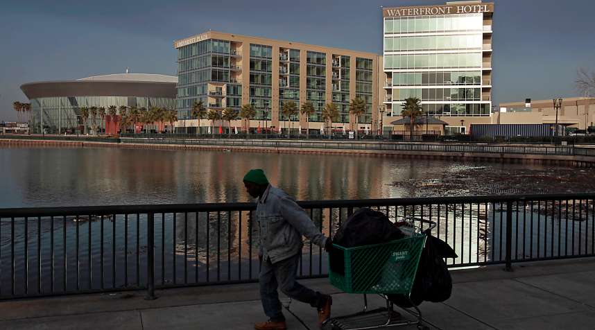 The Stockton Arena, left, and the University Plaza Waterfront Hotel were part of a multimillion dollar revitalization of downtown Stockton that has largely failed to produce the economic benefits promised by politicians and developers. Despite the expensive facelift of the city's waterfront, Stockton has not been able to shake its reputation as a seedy port town.  (Photo by Luis Sinco/Los Angeles Times via Getty Images)