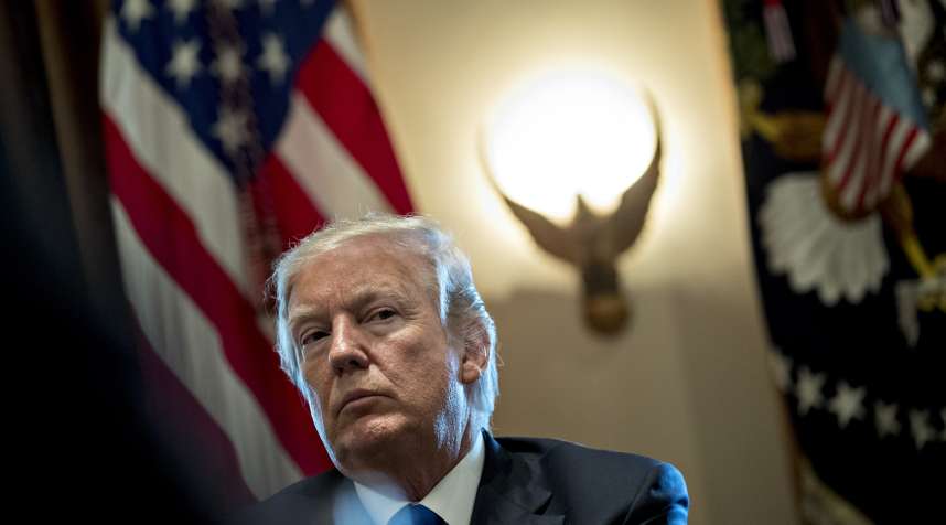FILE: U.S. President Donald Trump listens during a meeting with bipartisan members of Congress on immigration in the Cabinet Room of the White House in Washington, D.C., U.S., on Tuesday, Jan. 9, 2018. The one year anniversary of U.S. President Donald Trump's inauguration falls on Saturday, January 20, 2018. Our editors select the best archive images looking back over Trumps first year in office. Photographer: Andrew Harrer/Bloomberg via Getty Images