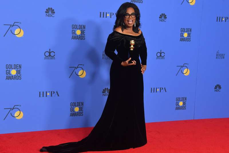 Actress and TV talk show host Oprah Winfrey poses with the Cecil B. DeMille Award during the 75th Golden Globe Awards on January 7, 2018, in Beverly Hills, California.