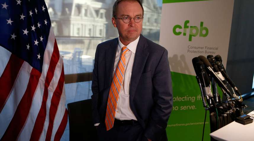 Office of Management and Budget (OMB) Director Mick Mulvaney arrives to speak to the media at the U.S. Consumer Financial Protection Bureau (CFPB),  where he began work earlier in the day after being named acting director by U.S. President Donald Trump in Washington November 27, 2017.