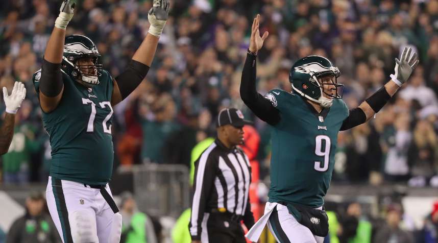 Nick Foles #9 of the Philadelphia Eagles celebrates a first quarter touchdown against the Minnesota Vikings in the NFC Championship game at Lincoln Financial Field on January 21, 2018 in Philadelphia, Pennsylvania.