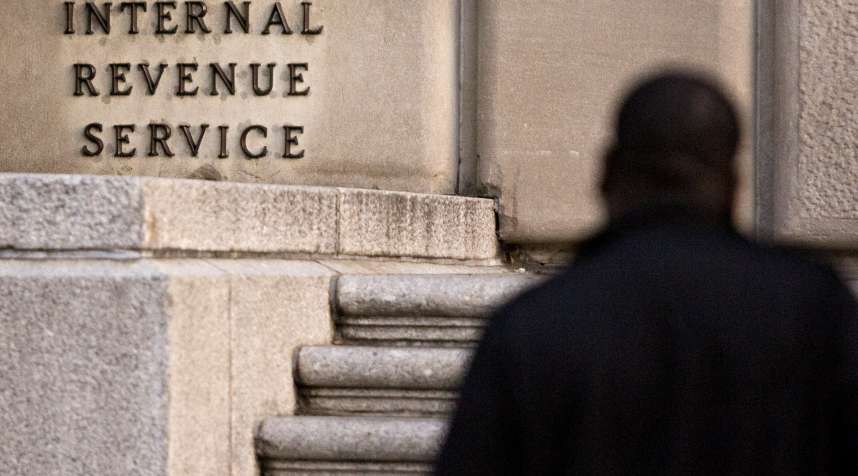 A man walks past the Internal Revenue Service (IRS) headquarters in Washington, D.C., on Oct. 20, 2017.