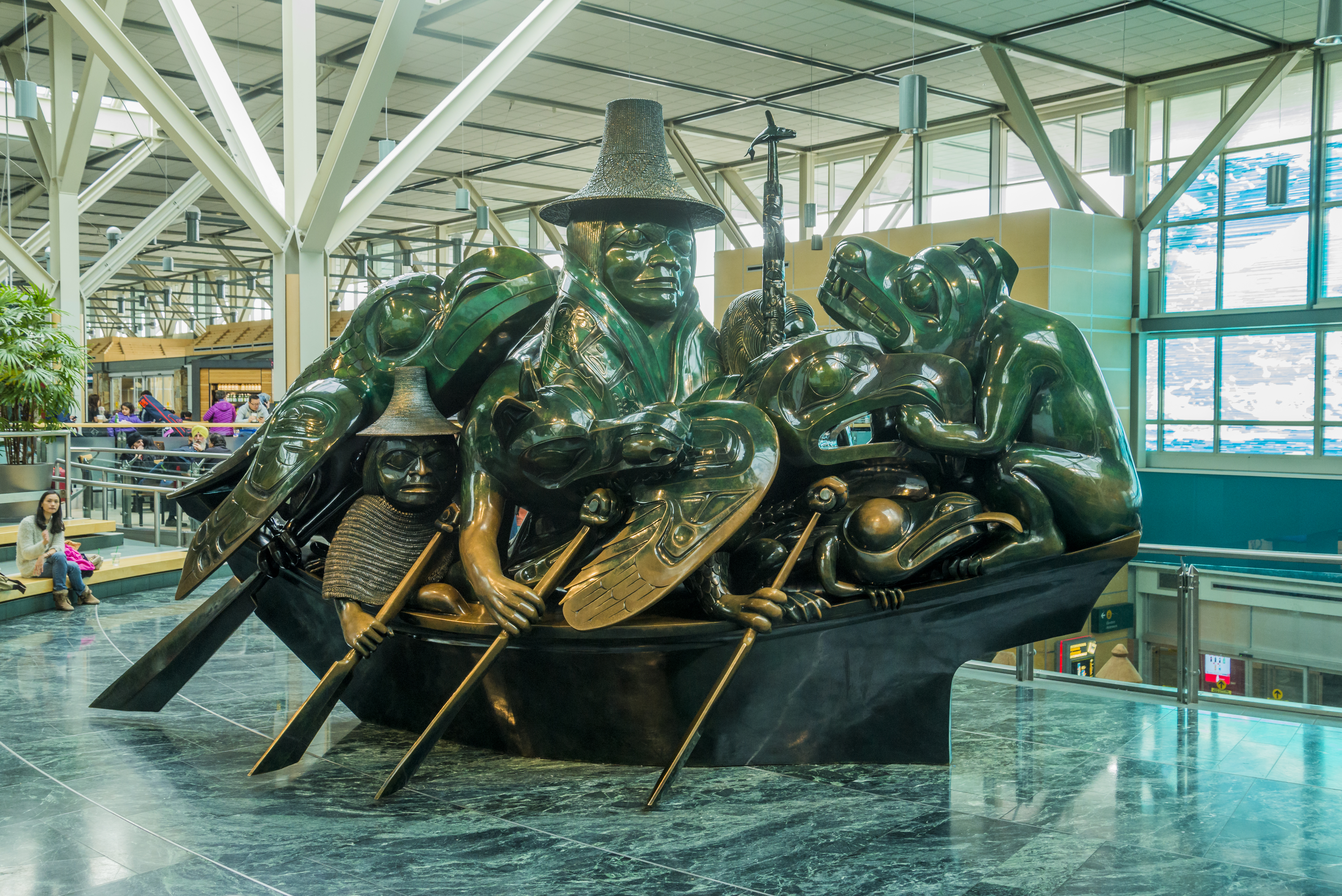 Cast bronze sculpture, The Spirit of Haida Gwaii, the Jade Canoe, by artist Bill Reid, Vancouver Airport, YVR, Richmond, British Columbia, Canada