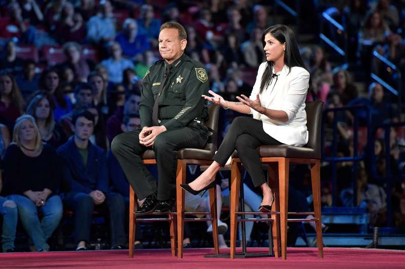 NRA spokesperson Dana Loesch answers a question while sitting next to Broward Sheriff Scott Israel, during a CNN town hall in Florida.