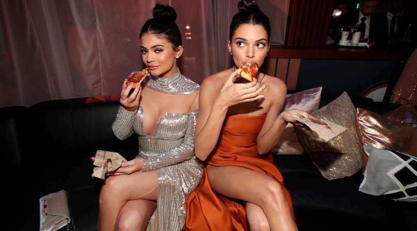 Pictured: (l-r) Kylie Jenner and Kendall Jenner pose during the Universal, NBC, Focus Features, E! Entertainment Golden Globes After Party