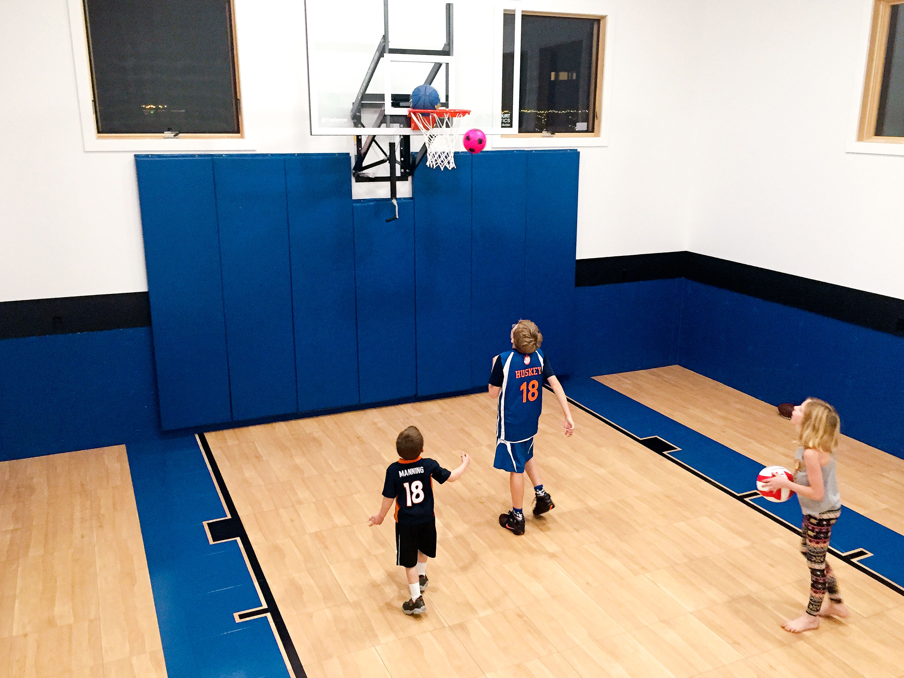 Play ball
                        
                        $5,000+
                        
                        Forget the driveway. You can practice indoors all winter like an NBA star. To be sure, a full 94-by-50-foot indoor court can run upwards of $50,000, and that’s assuming you have the space. But those are the exceptions not the rule for private homes, according to SnapSports, an athletic flooring company based in Salt Lake City, which installs about 1,000 play spaces a year. A 30-by-30-foot practice area with synthetic flooring, painted key and foul lines, and a hoop costs as little as $5,000, or about $5.50 per square foot. Bumping up your budget to $10,000 gets you a 30-by-50-foot half court with wall pads and a logo. The company says it has installed courts of all sizes in basements, barns, and unused guesthouses. While 16-foot-high ceilings are ideal, salesman Jimmy Wood says SnapSports has worked with ceilings as low as 10 feet.
