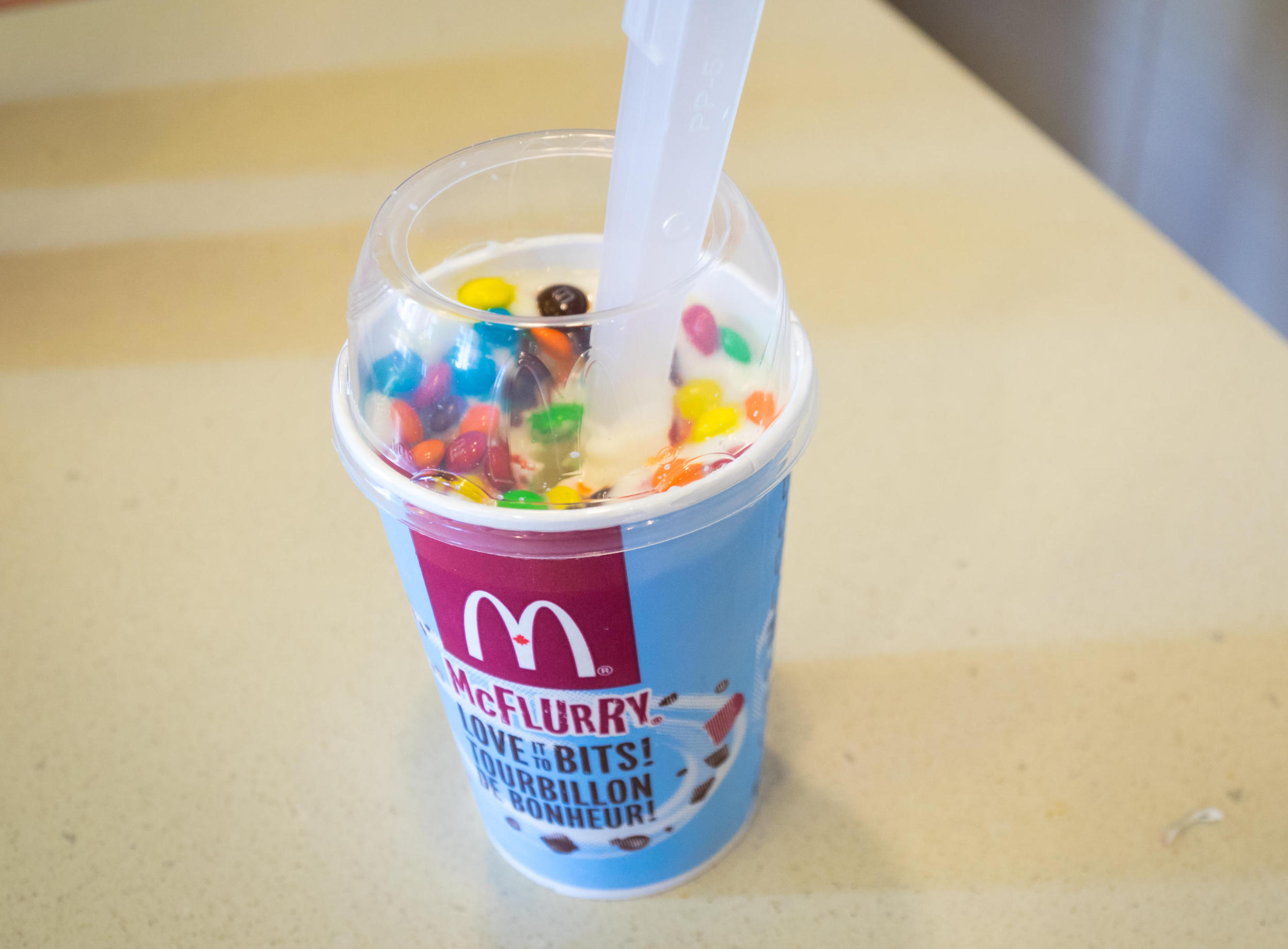 An M&amp;M's McFlurry, soft-serve ice cream dessert from McDonald's.
