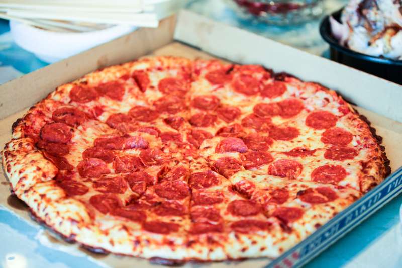 Pizza with salami and cheese