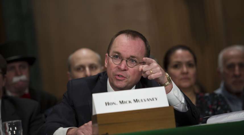 Mick Mulvaney, acting director of the Consumer Financial Protection Bureau (CFPB), speaks during a Senate Banking, Housing &amp; Urban Affairs Committee hearing in Washington, D.C., U.S., on Thursday, April 12, 2018. Senator Elizabeth Warren clashed with Mulvaney, accusing the former GOP congressman of putting politics ahead of protecting consumers.