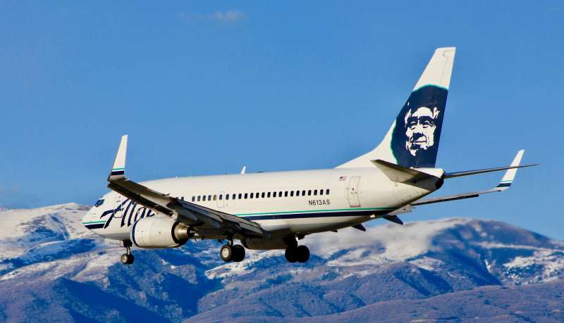 A Boeing 737-700 of Alaska Airlines lands at Salt Lake City International Airport.