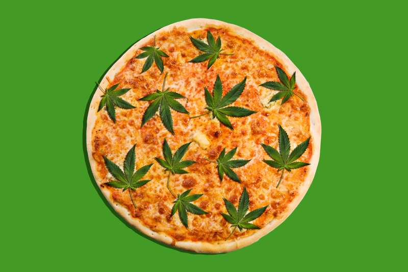 marijuana leaves as toppings on pizza