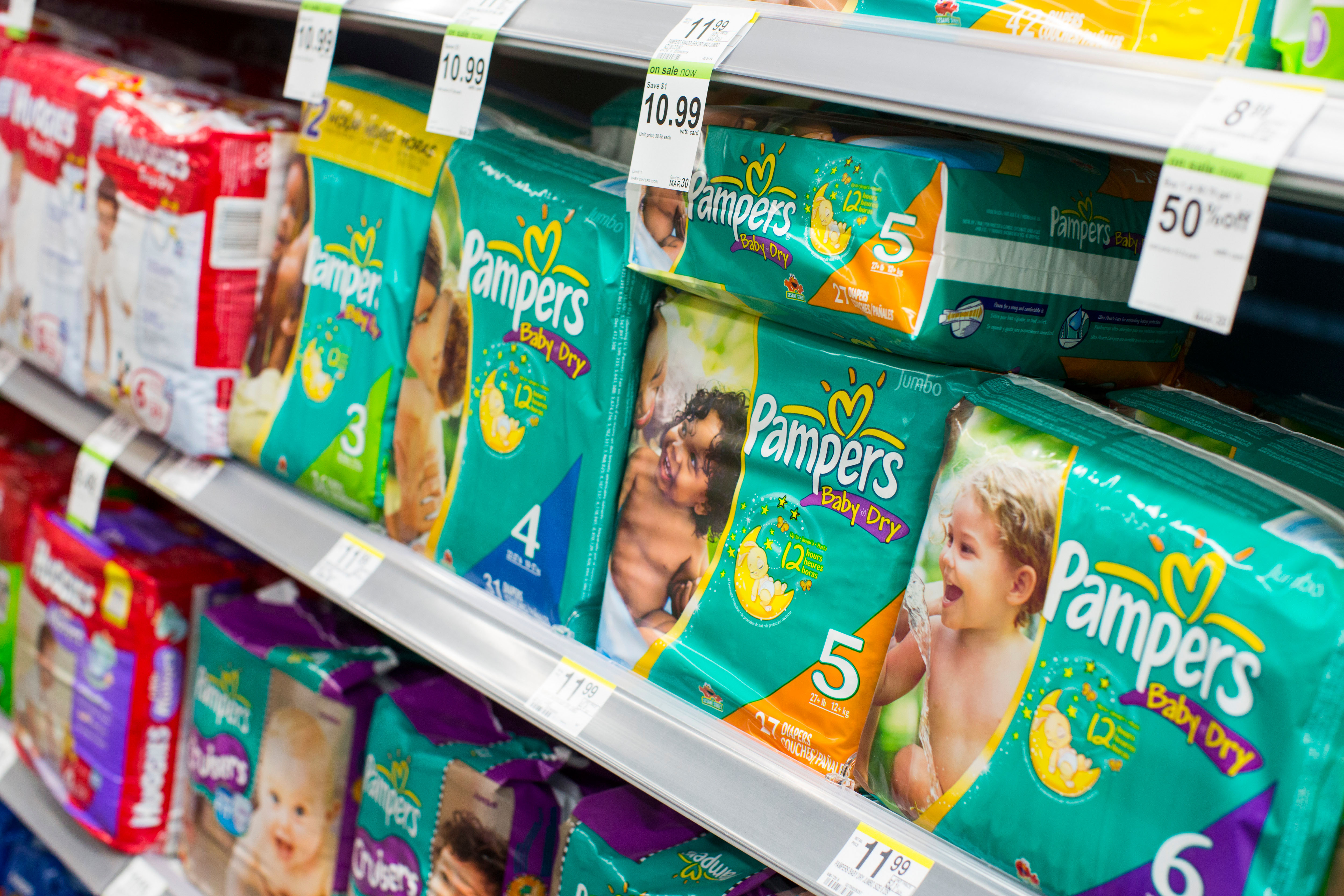 Pampers diapers on display at a store.