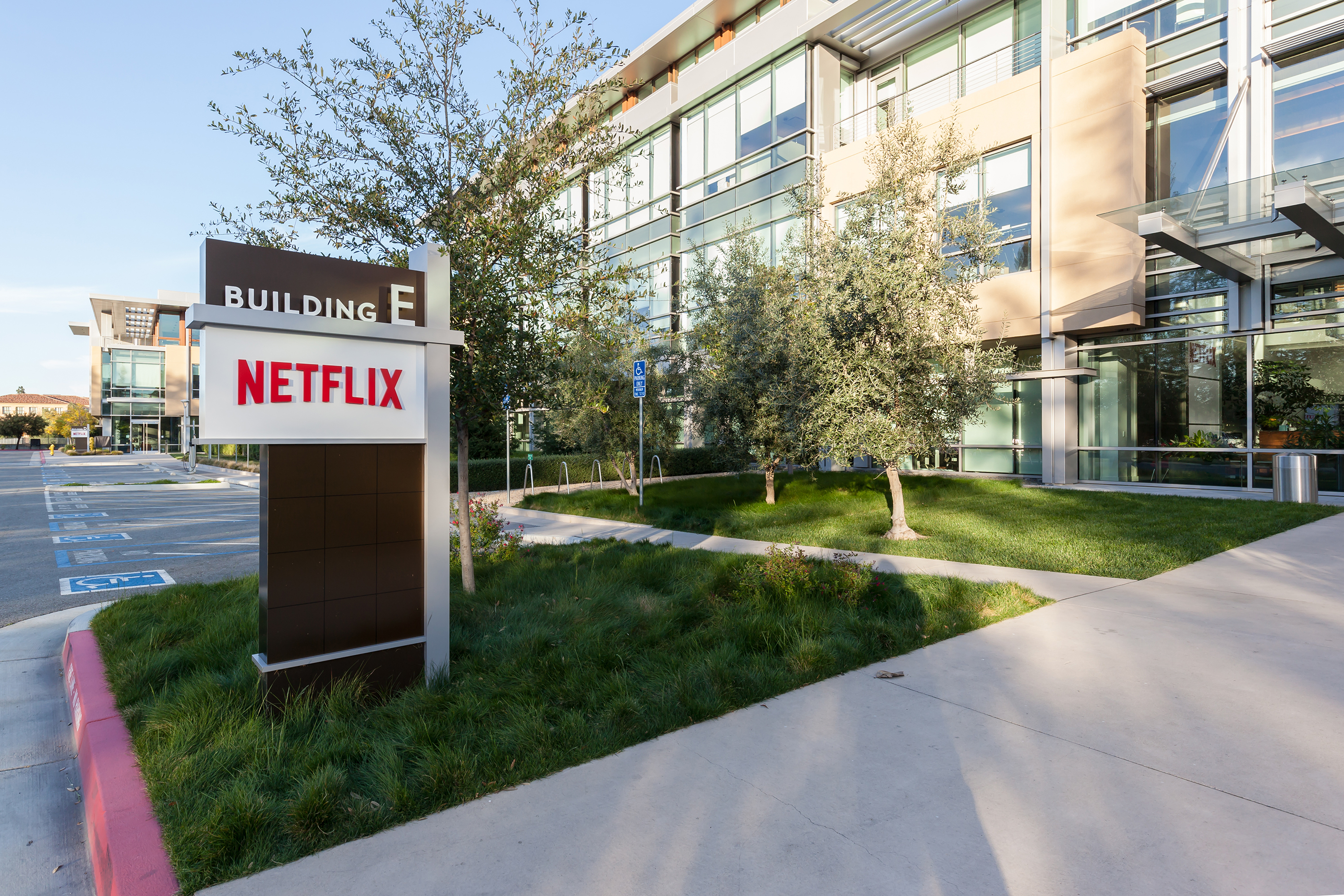 Los Gatos, California, USA - March 29, 2018: Sign of Netflix at headquarters in Los Gatos, CA. Netflix is an American entertainment company.; Shutterstock ID 1062522458; Publication: Money.com ; Job: 5/1/18 Six Figure Companies; Client/Licensee: Sarina Finkelstein; Other: